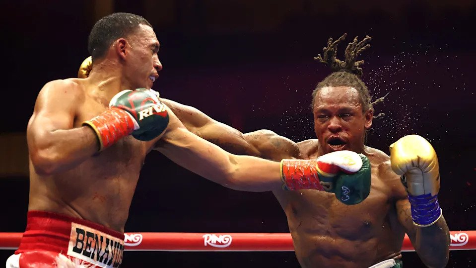 RIYADH, SAUDI ARABIA - NOVEMBER 22: (L-R) David Benavidez exchanges punches with Anthony Yarde in a WBC and WBA light-heavyweight title fight during Ring IV: Night of the Champions at ANB Arena on November 22, 2025 in Riyadh, Saudi Arabia. (Photo by Richard Pelham/Getty Images)