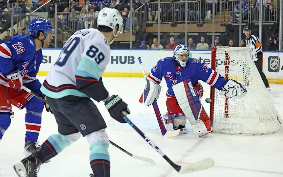 Jonathan Quick makes a save during the Rangers’ Jan. 12 game against the Kraken. Charles Wenzelberg