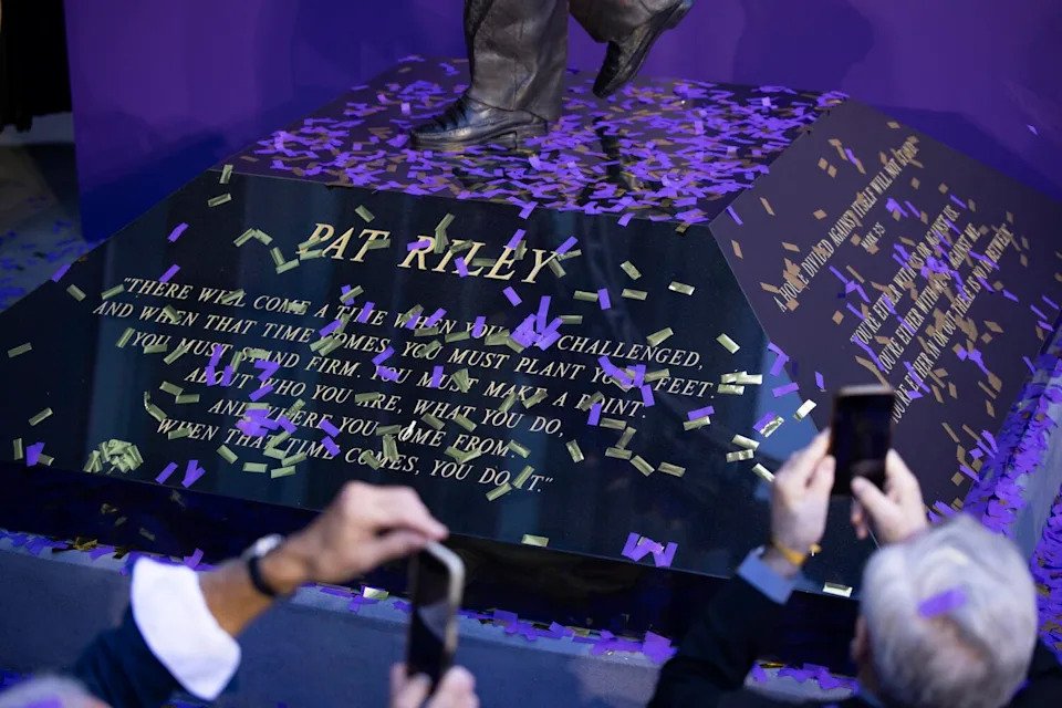 The base of Pat Riley's new statue features quotes from the former Lakers coach. It was unveiled at Crypto.com Arena.