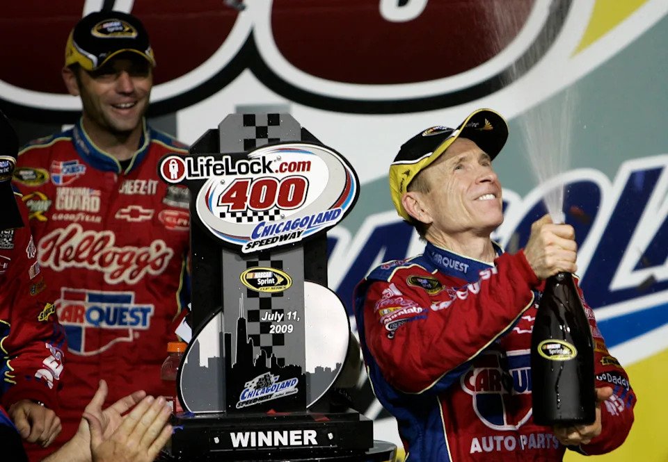 NASCAR Sprint Cup Series driver Mark Martin celebrates in victory lane after winning the Lifelock.com 400 at Chicagoland Speedway.Jerry Lai-Imagn Images
