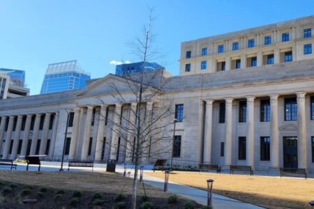 Joe Gibbs Racing, Chirs Gabehart and Spire have their first day in court