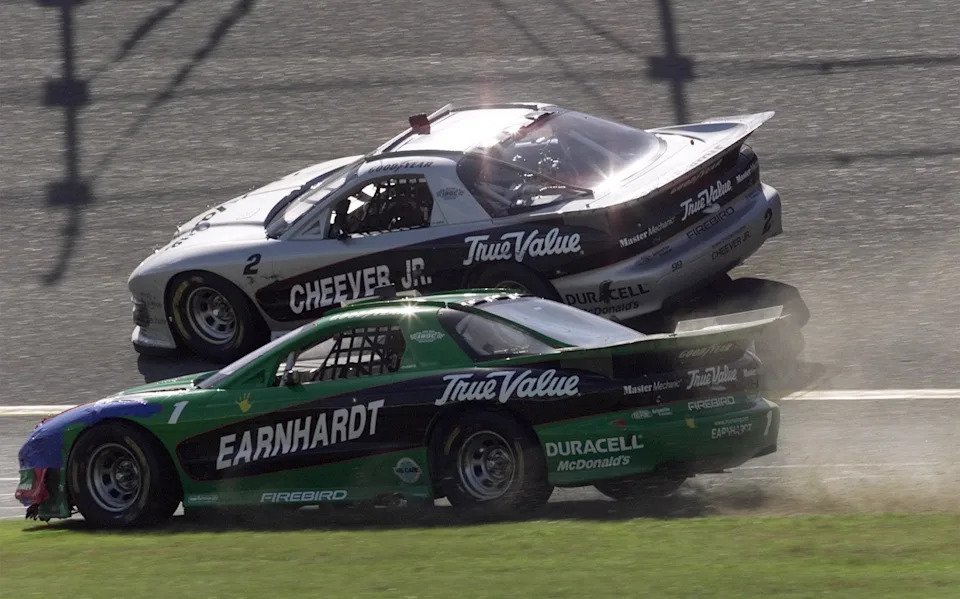 Dale Earnhardt was forced to take it to the grass and save it after "tradin' paint" with Eddie Cheever (above) during the 2001 IROC race at Daytona.