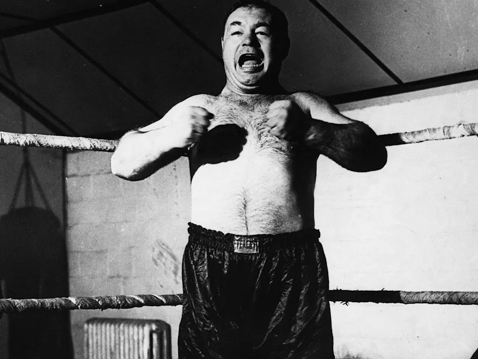(Original Caption) Tony Galento and that famous pre-fight war-cry during his heyday. (Photo by © Hulton-Deutsch Collection/CORBIS/Corbis via Getty Images)