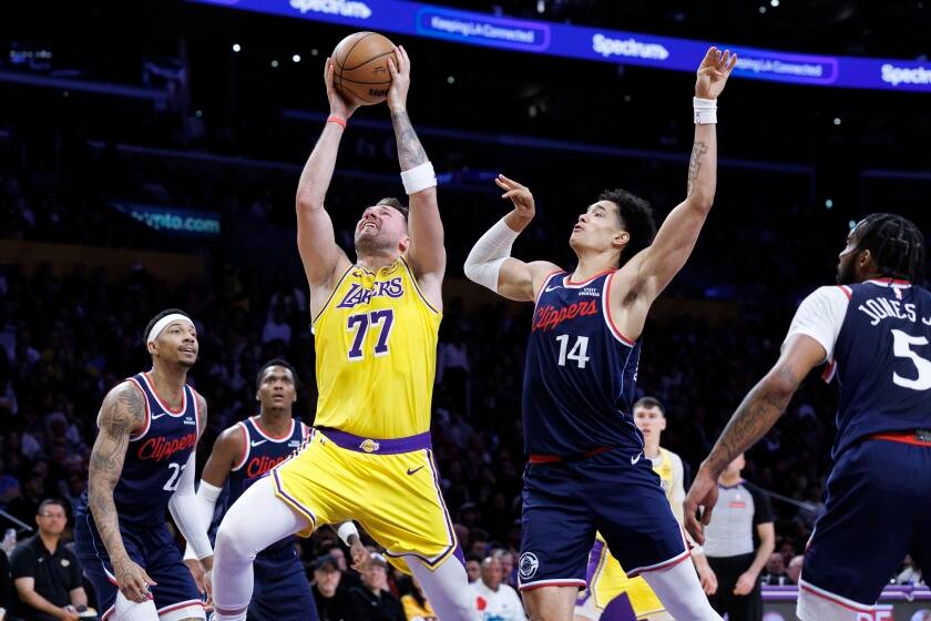 Luka Doncic and Lakers hold off Clippers as Kawhi Leonard exits late