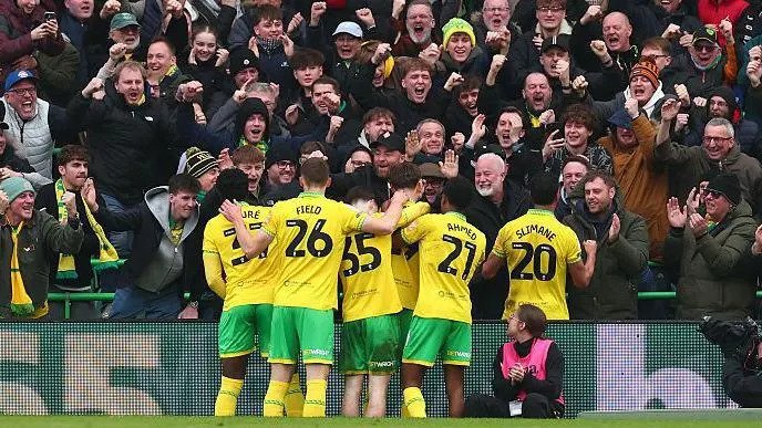 Norwich City players celebrate with the fans during their win over Blackburn Rovers