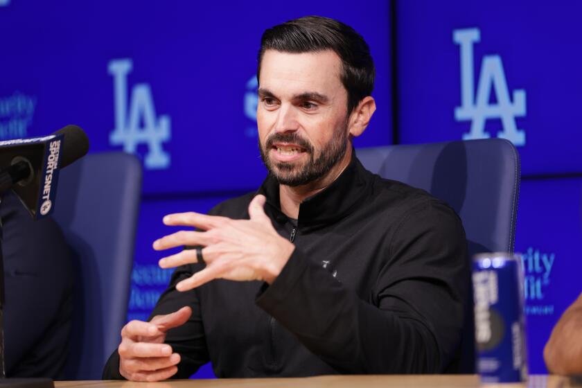 Dodgers GM Brandon Gomes responds to Manny Machado, Bryce Harper comments about spending