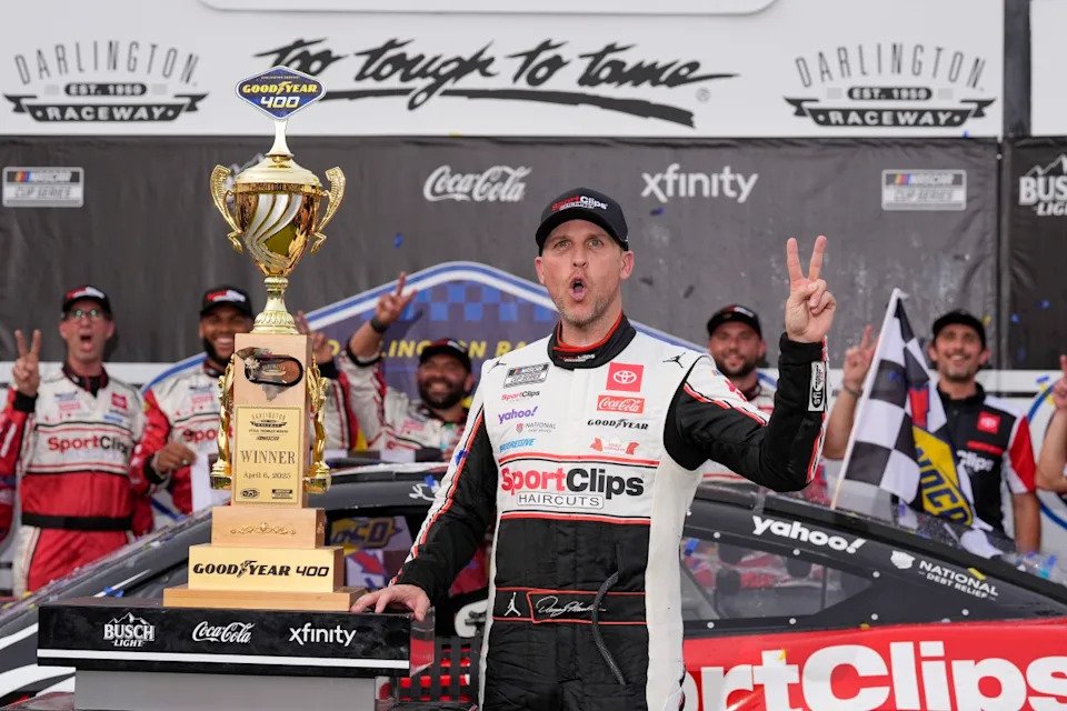 Denny Hamlin celebrating his win at Darlington Raceway.Jim Dedmon-Imagn Images