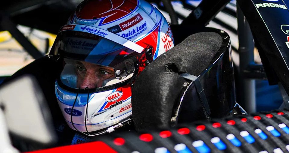 Josh Berry looks on, strapped into the No. 21 Ford at Las Vegas Motor Speedway