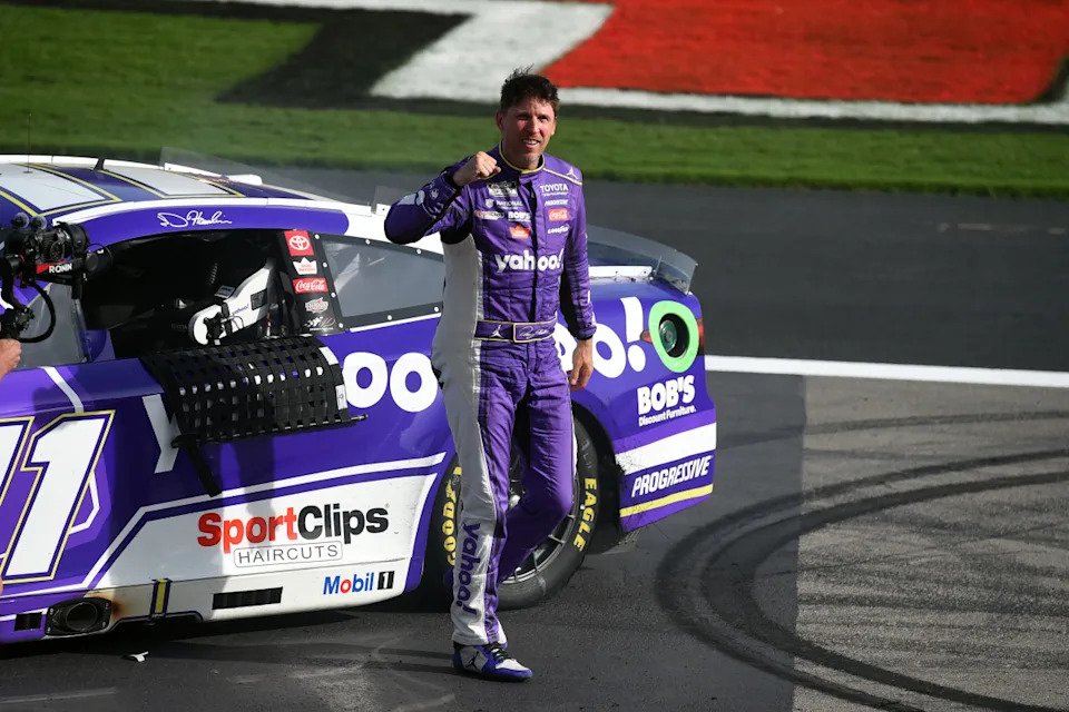 Denny Hamlin celebrates with a fist pump after winning at Las Vegas. &lpar;Photo by Chris Williams&sol;LVMS&sol;Icon Sportswire via Getty Images&rpar;