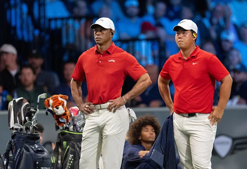 Tiger Woods and Tom Kim of Jupiter Links GC react to their loss to Los Angeles Golf Club in the TGL finals at SoFi Center on March 24, 2026, in Palm Beach Gardens, Florida.