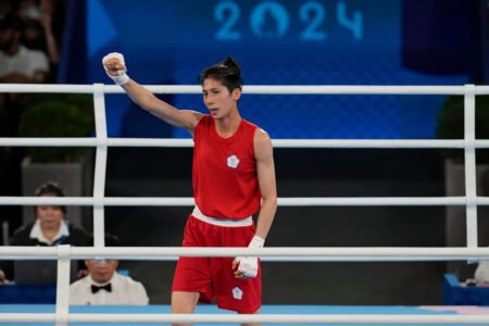 Taiwan Olympic boxing champ involved in gender debate wins first bout at Asian titles