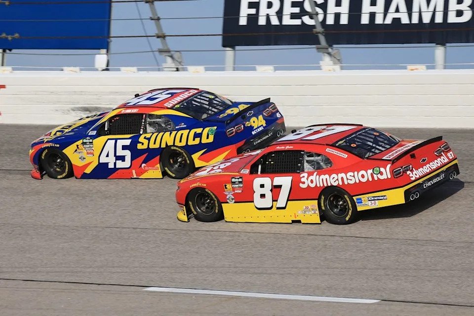 Austin Green, No. 87, and Lavar Scott, No. 45