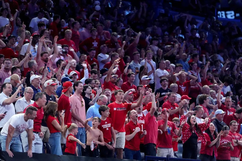 41 years in the making: Nebraska players celebrate March Madness win with longtime announcer