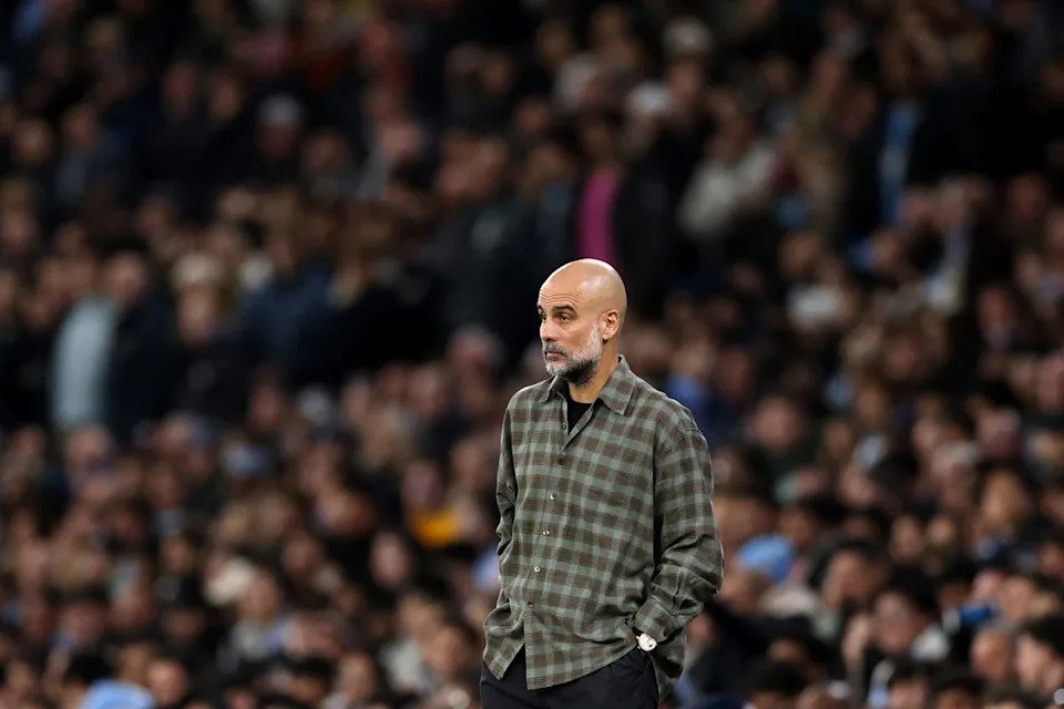 A sombre Pep Guardiola on Tuesday night (Getty)