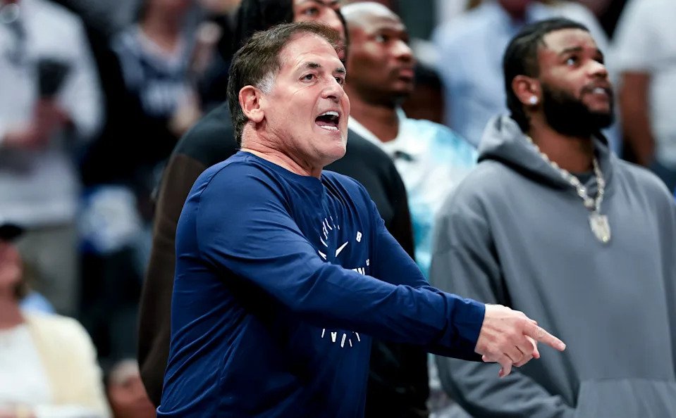 Mark Cuban reacts against the Philadelphia 76ers during the second half at American Airlines Center.