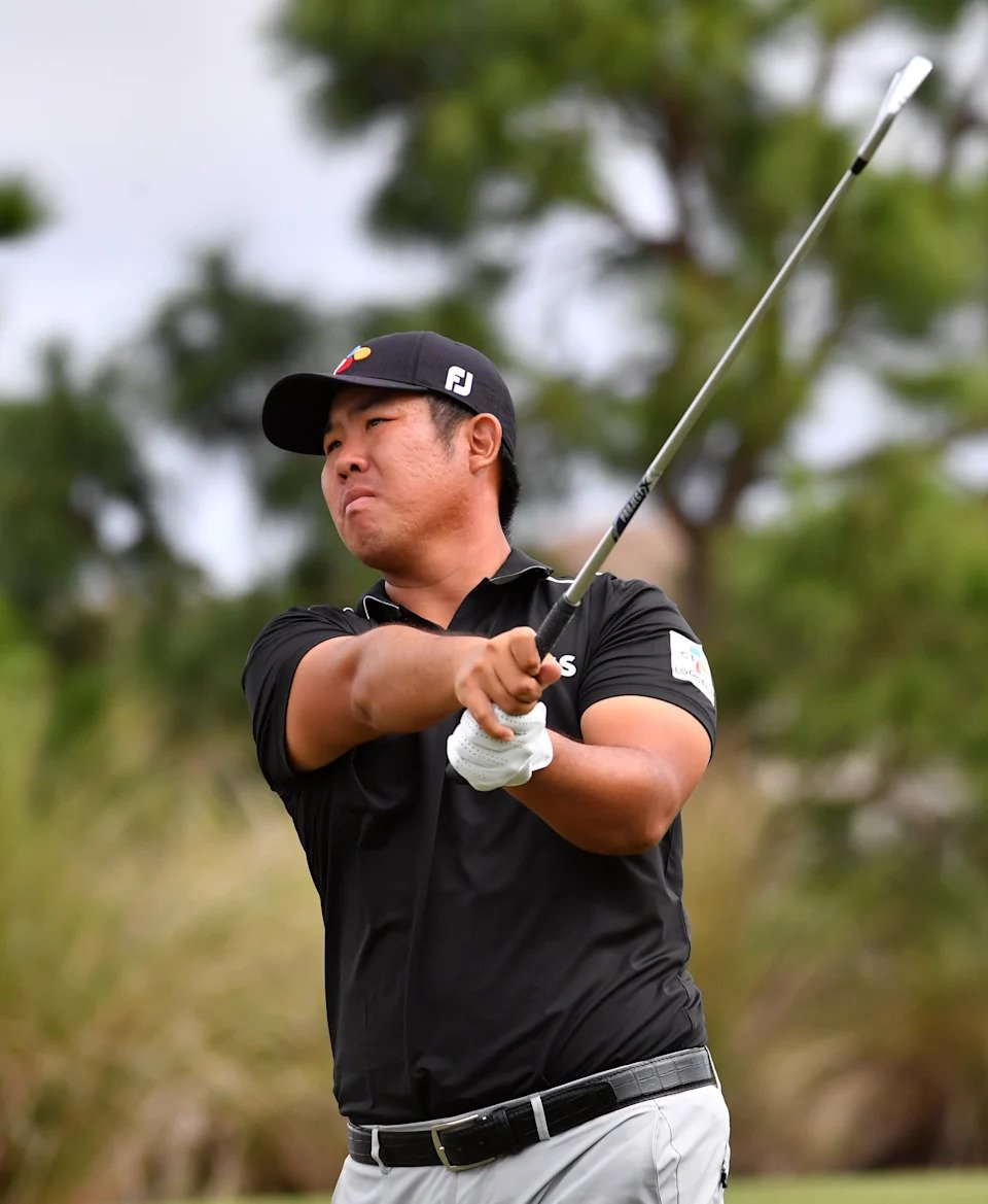 Byeong Hun An of Seoul, Korea, hits from the tee of the par 3, 253-yard, third hole on Friday, Feb. 18, 2022 during the second round of the LECOM Suncoast Classic on the Korn Ferry Tour at Lakewood National Golf Club.