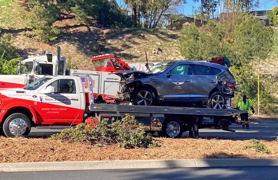 The vehicle driven by Tiger Woods on the back of a truck in Los Angeles following his crash on February 23, 2021 (PA)