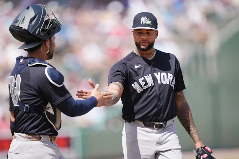 New York Yankees catcher Payton Henry (79) congratulates pitcher Luis Gil (81) after the first inning against the Boston Red Sox at JetBlue Park at Fenway South. IMAGN IMAGES via Reuters Connect