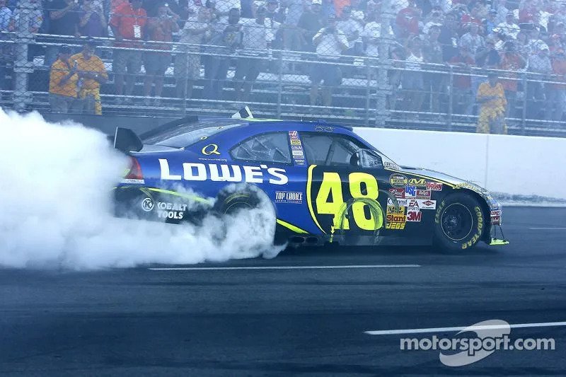 Race winner Jimmie Johnson celebrates