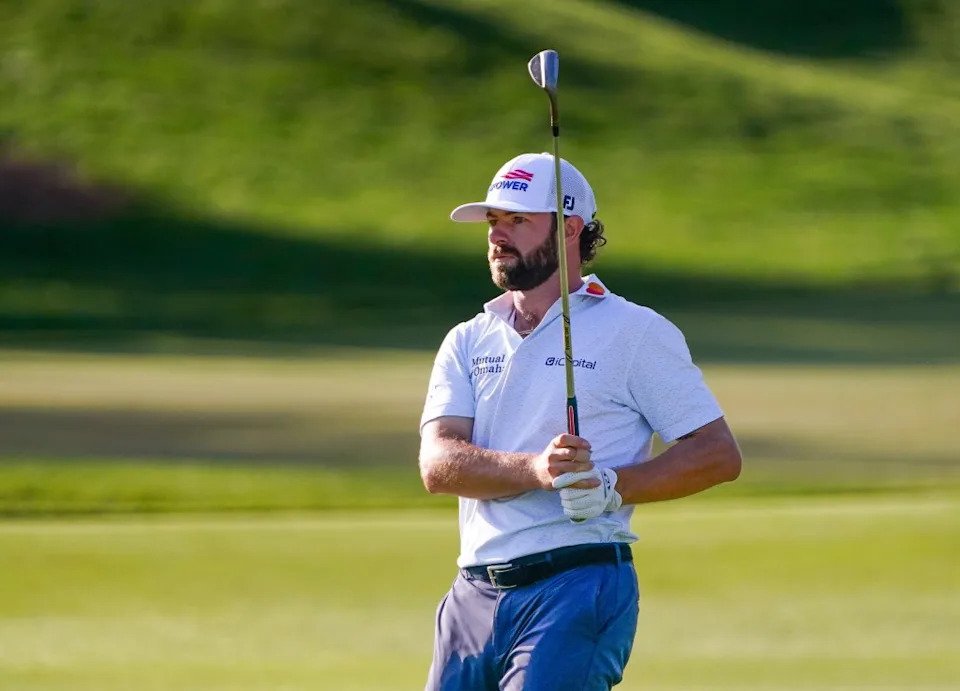 Cameron Young, hitting an approach shot into the 16th green, is in third place heading into the final round of the Players Championship. Jeff Romance-Imagn Images