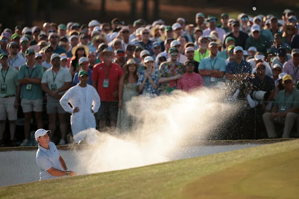 McIlroy was required to escape from the bunker on the 18th in order to avoid a double bogey (Getty Images)