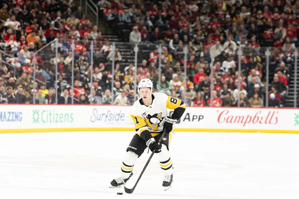 Apr 9, 2026; Newark, New Jersey, USA; Pittsburgh Penguins center Ben Kindel (81) skates with the puck against the New Jersey Devils during the first period at Prudential Center. Mandatory Credit: Luther Schlaifer-Imagn Images