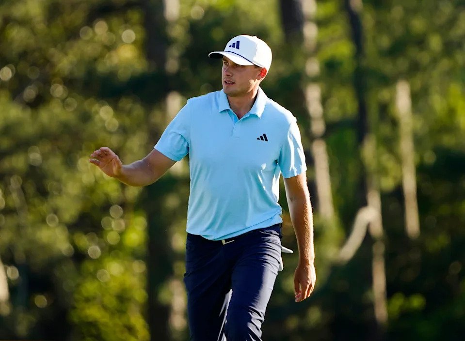 Ludvig Aberg acknowledges the gallery as he walks toward the No.18 green during the third round of the 2024 Masters Tournament. (Photo: Katie Goodale-USA TODAY Network)