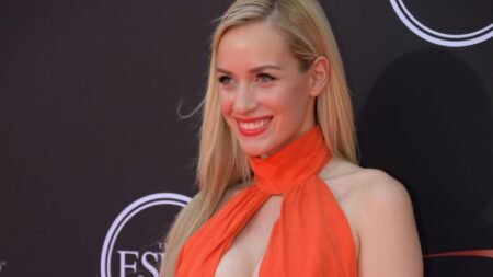 Ex pro golfer teaches how to swing with 34DDs