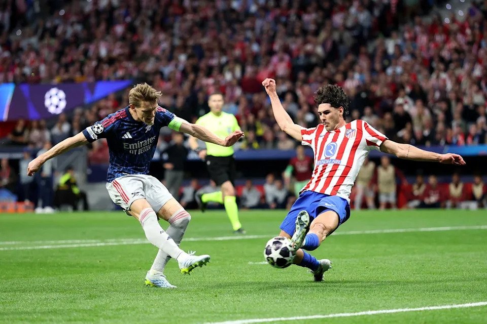 Odegaard was the first Arsenal player subbed, coming off after Atletico equalised (Getty)