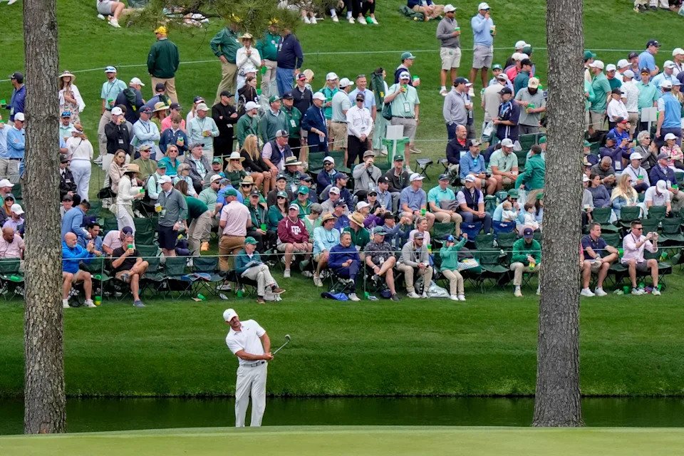 Apr 6, 2026; Augusta, Georgia, USA; Brooks Koepka hits onto the 15th green during a practice round for the Masters Tournament at Augusta National Golf Club. Mandatory Credit: Katie Goodale-Imagn Images