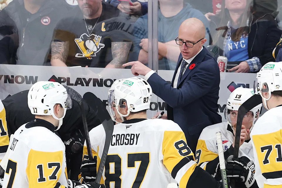 Nov 1, 2025; Winnipeg, Manitoba, CAN; Pittsburgh Penguins head coach Dan Muse instructs players during a time out against the Winnipeg Jets in the third period at Canada Life Centre. Mandatory Credit: James Carey Lauder-Imagn Images