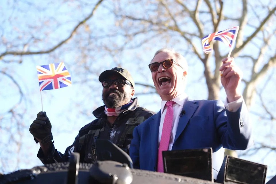 Derek Chisora (left) arrived to his press conference with Reform UK leader Nigel Farage in a tank (Adam Davy/PA) (PA Wire)