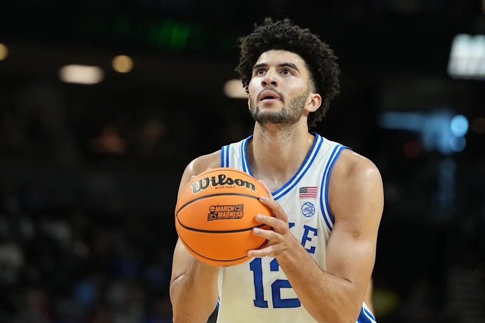 Duke Blue Devils forward Cameron Boozer (12) shoots a free throw against the Siena Saints in the first half during a first round game of the men's 2026 NCAA Tournament at Bon Secours Wellness Arena.
