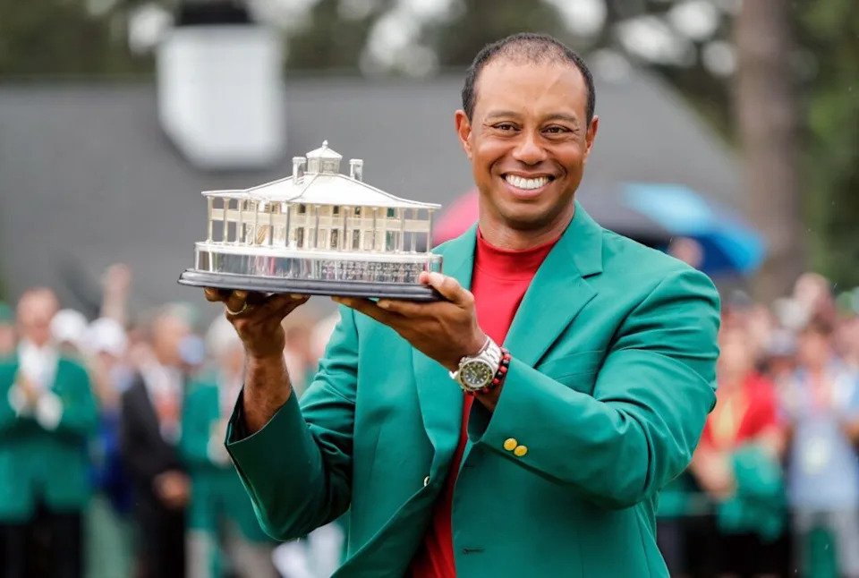 Tiger Woods celebrates during the trophy presentation after winning the Masters Tournament at Augusta National Golf Club, Sunday, April 14, 2019, in Augusta, Georgia. ALLEN EYESTONE/FOR THE AUGUSTA CHRONICLE
