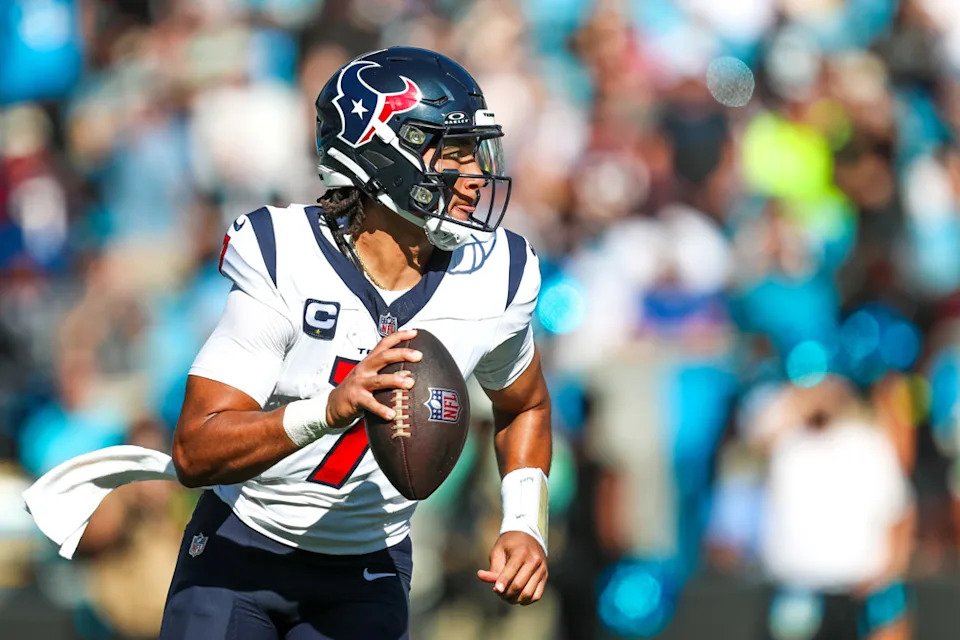 CHARLOTTE, NC - OCTOBER 29: C.J. Stroud #7 of the Houston Texans runs with the ball during a football game against the Carolina Panthers at Bank of America Stadium in Charlotte, North Carolina on Oct 29, 2023. (Photo by David Jensen/Icon Sportswire)