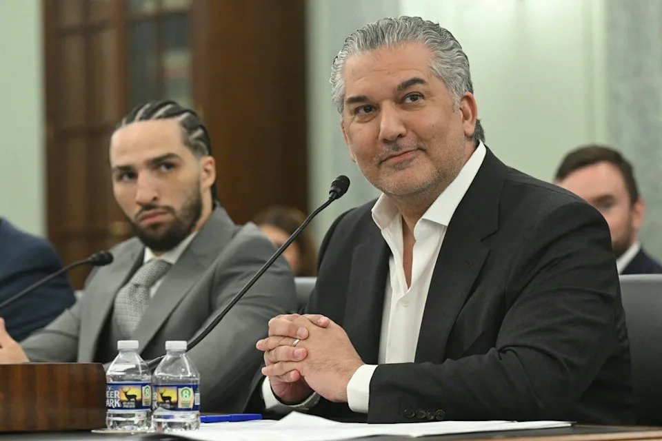 Nick Khan (right) and Nico Ali Walsh (AFP/Getty)