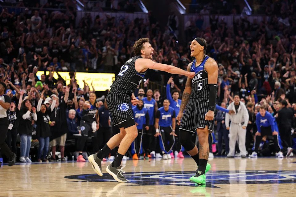 Orlando Magic forward Franz Wagner reacts to a shot by forward Paolo Banchero against the Detroit Pistons in the fourth quarter during game three of the first round of the 2026 NBA Playoffs at Kia Center.