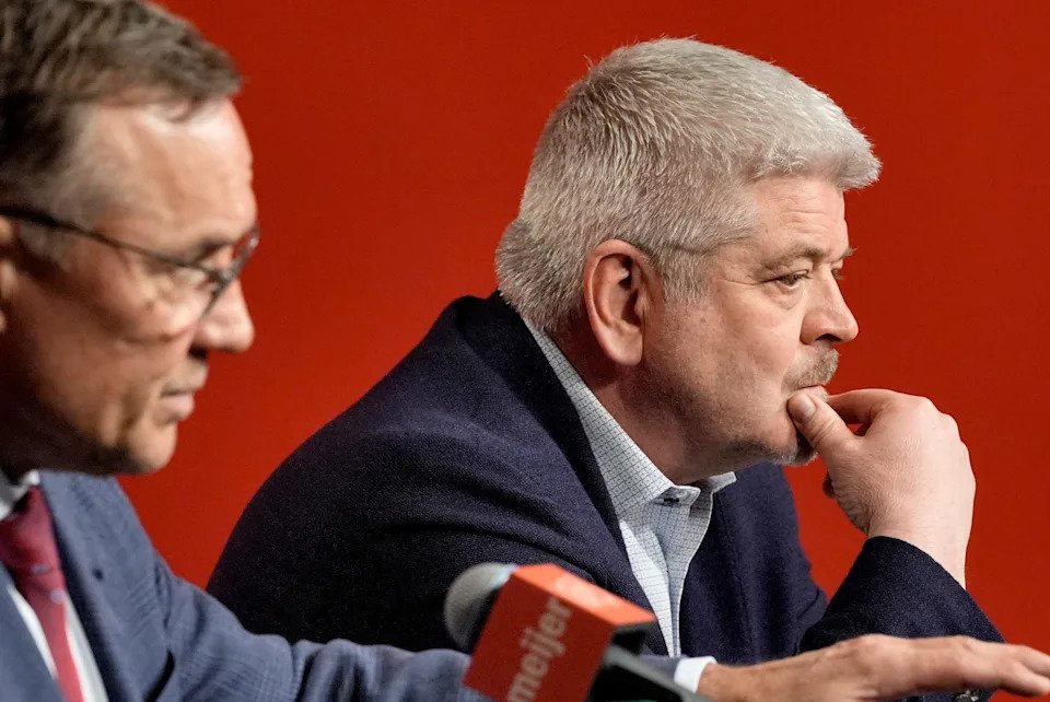 Detroit Red Wings general manager Steve Yzerman talks as coach Todd McLellan listens on Thursday, April 23, 2026 at Little Caesars Arena for their season-ending news conference after missing the NHL playoffs again.