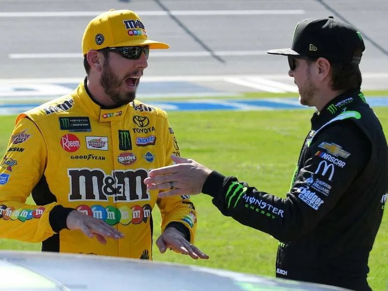 TALLADEGA, AL – APRIL 27: Brothers Kyle Busch, Joe Gibbs Racing, Toyota Camry M&MÕs Chocolate Bar (18) and Kurt Busch, Chip Ganassi Racing, Chevrolet Camaro Monster Energy (1) talk during qualifying for the Monster Energy Cup Series Geico 500 on April 27, 2019, at Talladega Superspeedway in Talladega, AL.(Photo by Jeffrey Vest/Icon Sportswire) AUTO: APR 27 Monster Energy NASCAR Motorsport USA Cup Series – GEICO 500 PUBLICATIONxINxGERxSUIxAUTxHUNxRUSxSWExNORxDENxONLY Icon190427021500