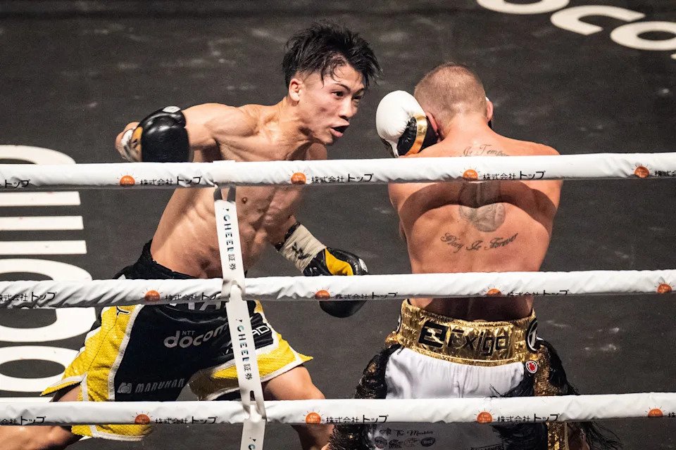 Japans Naoya Inoue (L) and Britains Paul Butler fight during their bantamweight title unification match in Tokyo on December 13, 2022. (Photo by Yuichi YAMAZAKI / AFP) (Photo by YUICHI YAMAZAKI/AFP via Getty Images)