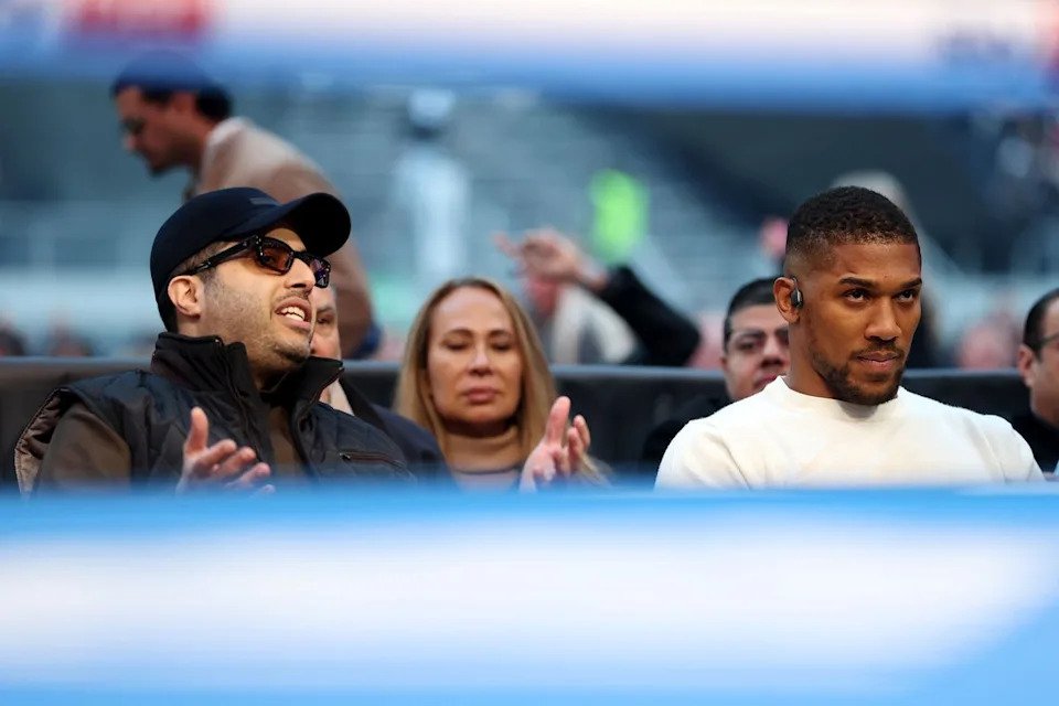 Joshua (right) with Saudi boxing matchmaker Turki Alalshikh (Getty Images for Netflix)