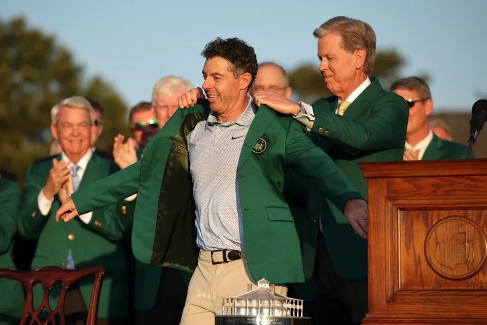 Rory McIlroy was presented with the green jacket by Augusta National chairman Fred Ridley (Getty)