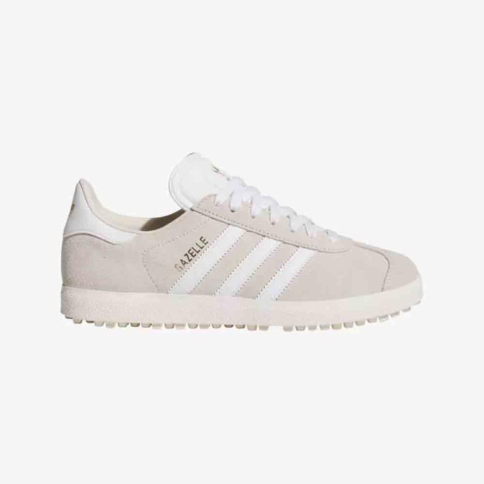 A beige Adidas Gazelle sneaker with white stripes, white laces, and a white sole, shown in a side profile view on a plain white background—an ideal gift for Mother’s Day.