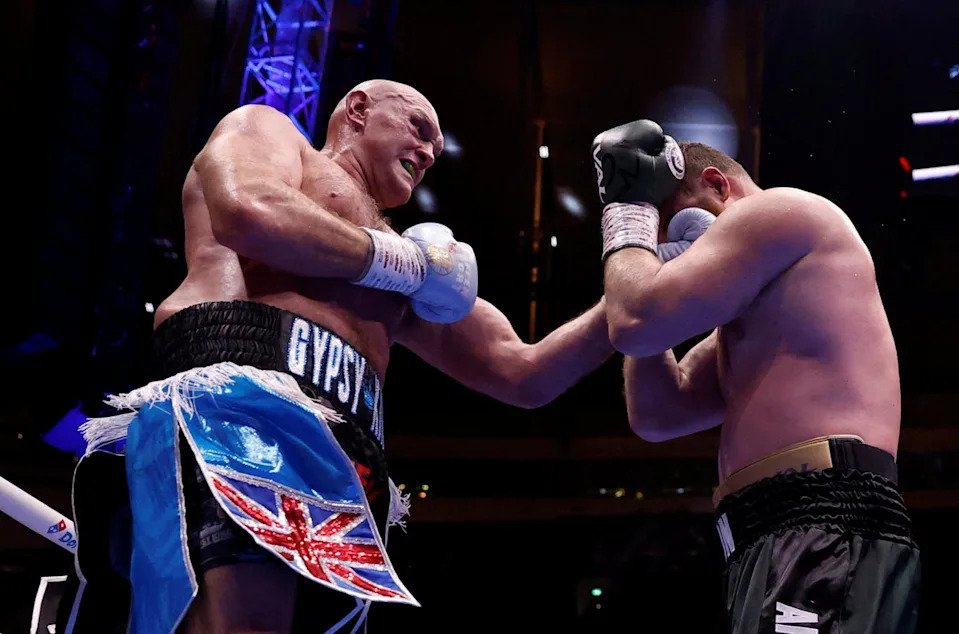 Fury (left) was a comfortable but not especially impressive winner over Arslanbek Makhmudov (Reuters)