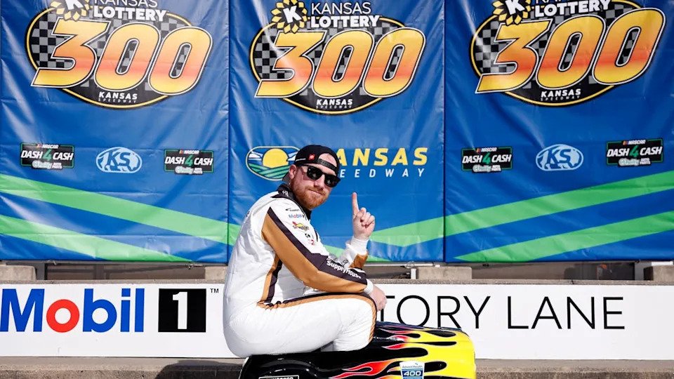 Tyler Reddick rides on the pedal car after winning the pole award at Kansas Speedway.&lpar;Photo by Sean Gardner&sol;Getty Images&rpar;