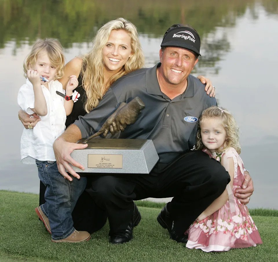 Phil Mickelson and his family celebrate with the trophy after winning the 2026 BellSouth Classic at TPC Sugarloaf.