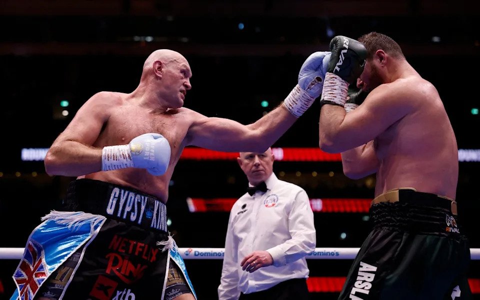 Tyson Fury (left) eased past Arslanbek Makhmudov on points this month (Reuters)