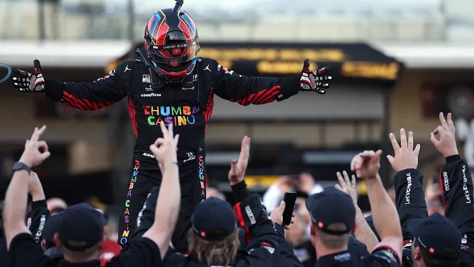 Tyler Reddick and his team celebrate after a three-peat to start the 2026 season. James Gilbert&sol;Getty Images