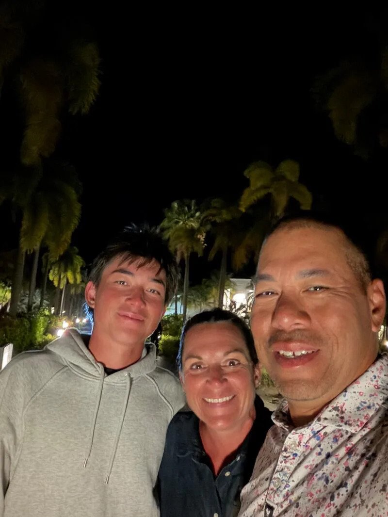 Kihei Akina poses for a picture with his parents, Alan and LeAnn. | Courtesy Kihei Akina