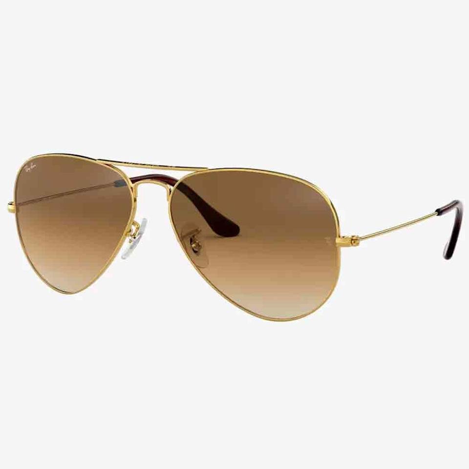 Aviator-style sunglasses with gold metal frames and brown gradient lenses, featuring thin temples and clear nose pads—an elegant gift idea for Mother’s Day, displayed on a white background.